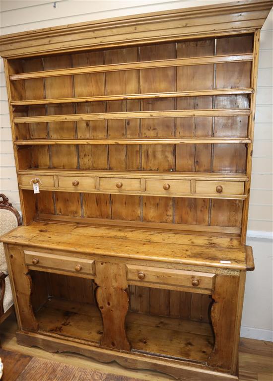 A 19th century Irish pine fiddle front dresser W.164cm